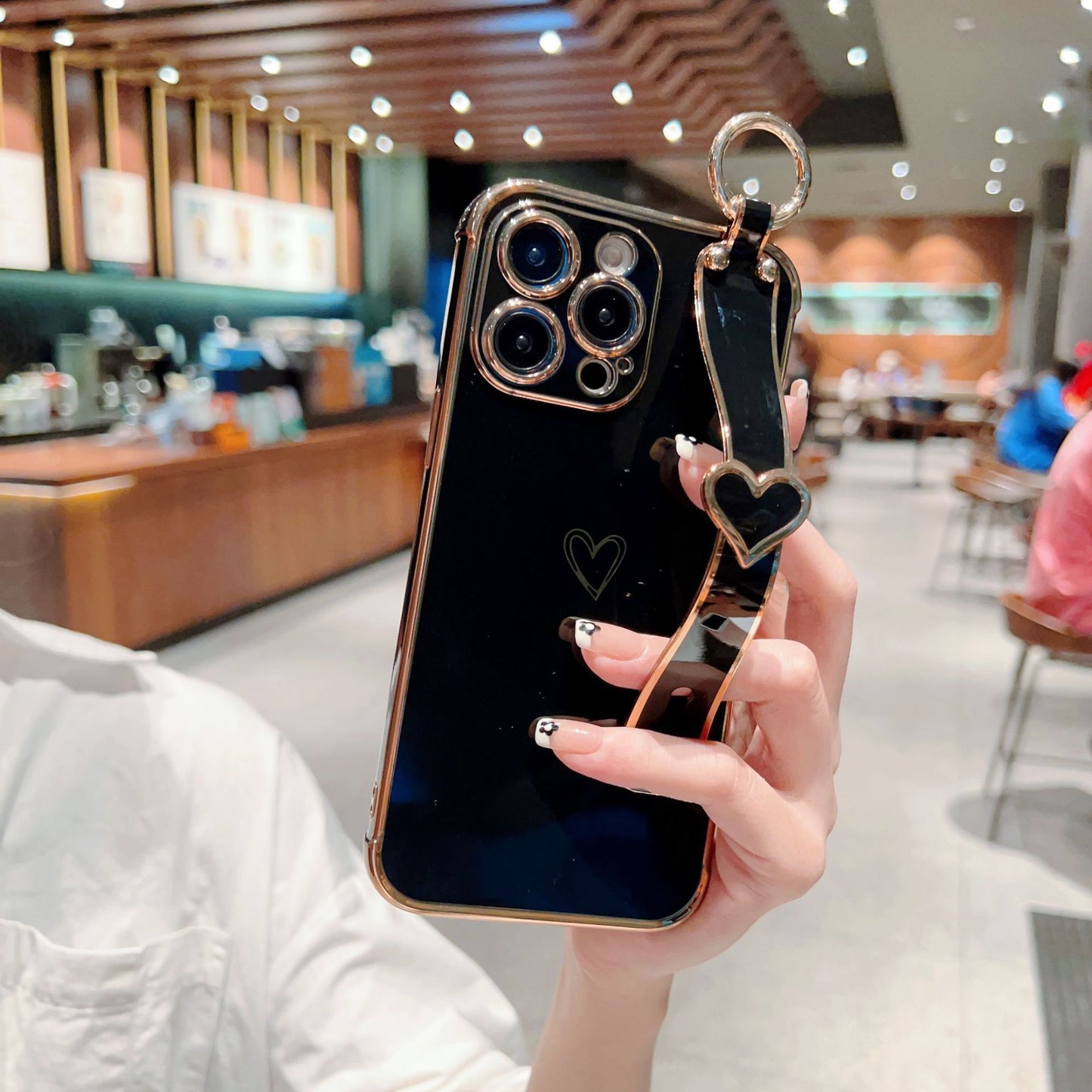 Electroplated Hollow Heart Wrist With Phone Case For iPhone 14