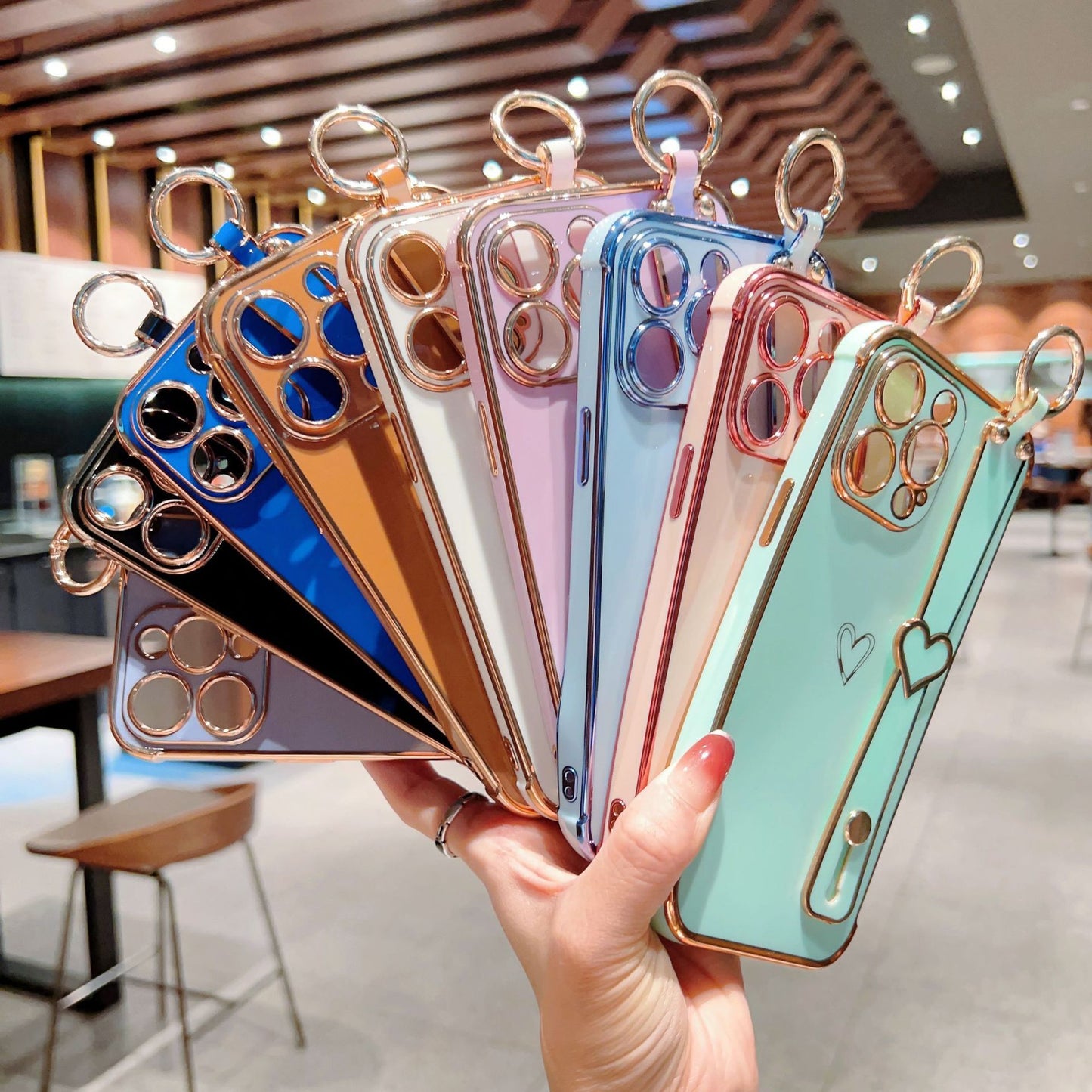 Electroplated Hollow Heart Wrist With Phone Case For iPhone 14