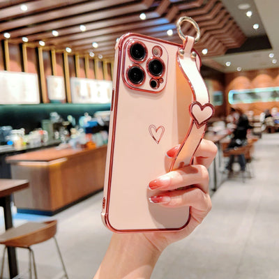 Electroplated Hollow Heart Wrist With Phone Case For iPhone 14